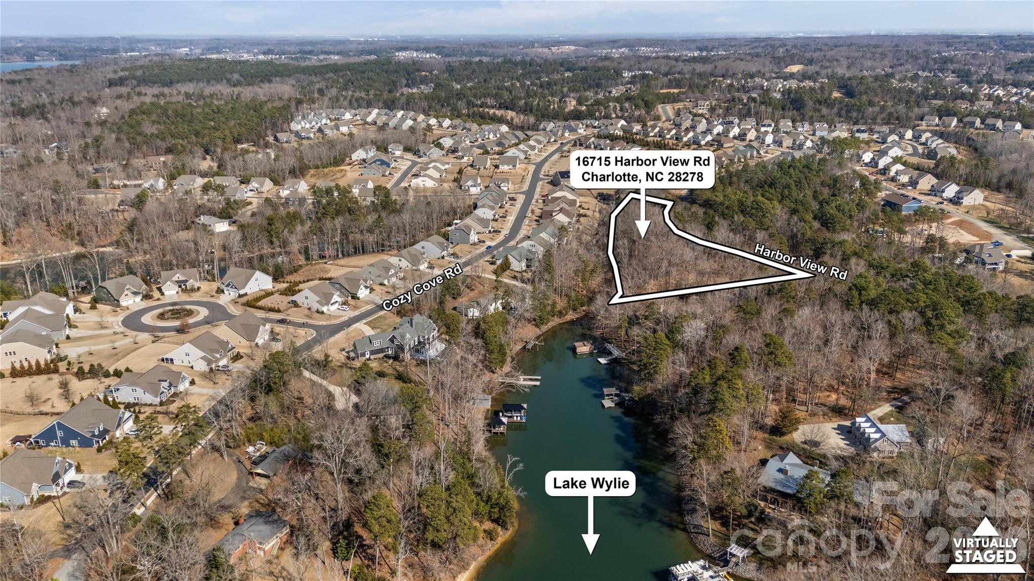 16715 Harbor View Road Charlotte, NC 28278 - Photo 3 of 9 an aerial view of residential building with parking space
