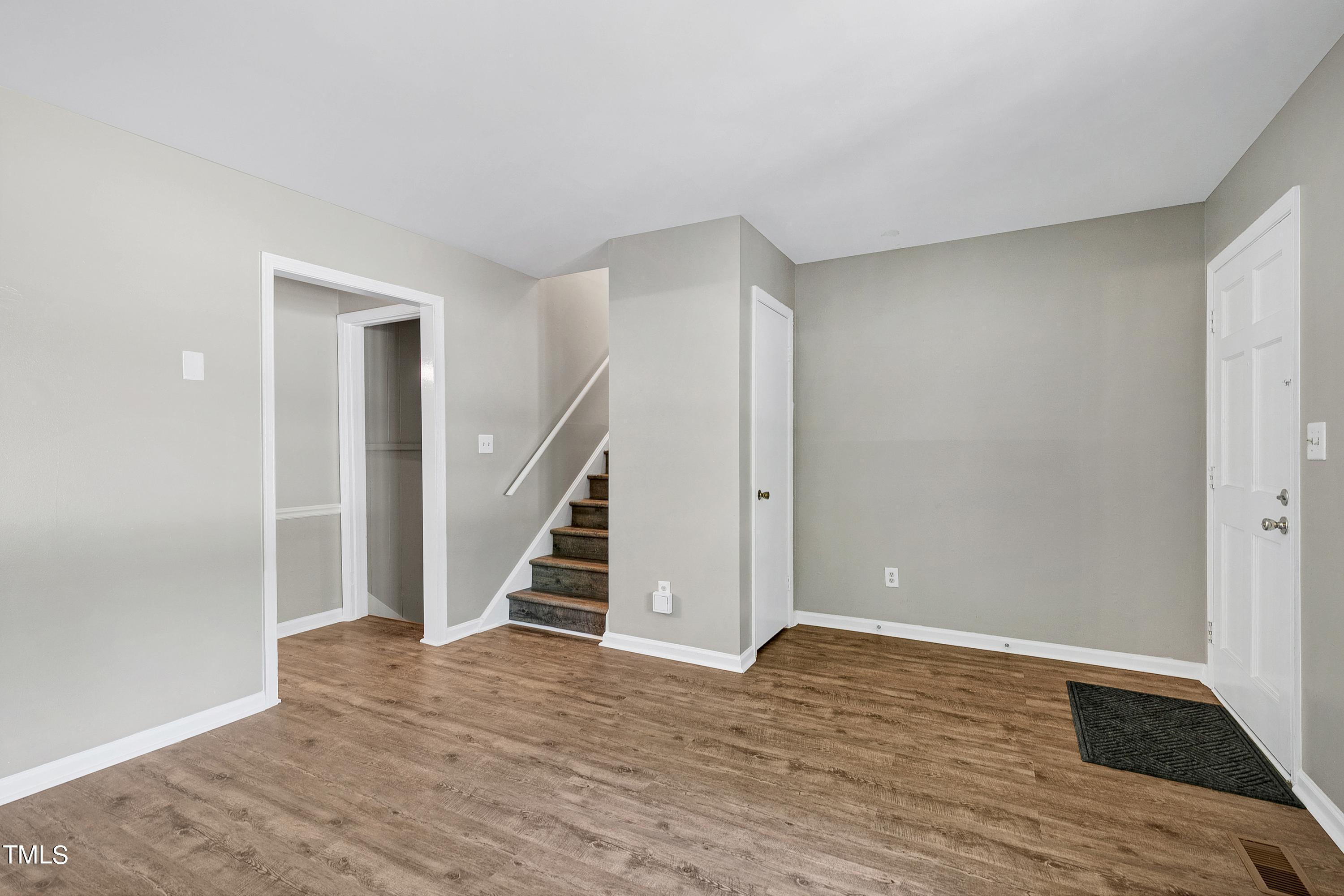 7804 Hemlock Court Raleigh, NC 27615 - Photo 7 of 22 # 7 - LR to stairs