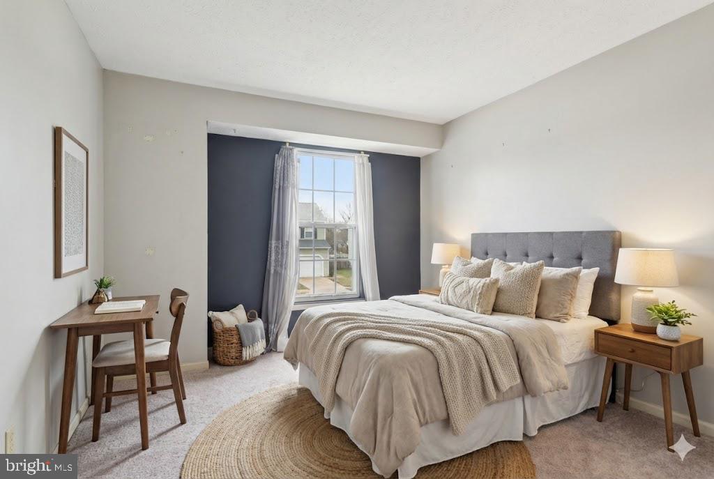 7934 Galloping Circle Windsor Mill, MD 21244 - Photo 29 of 38 a bedroom with a bed and a window