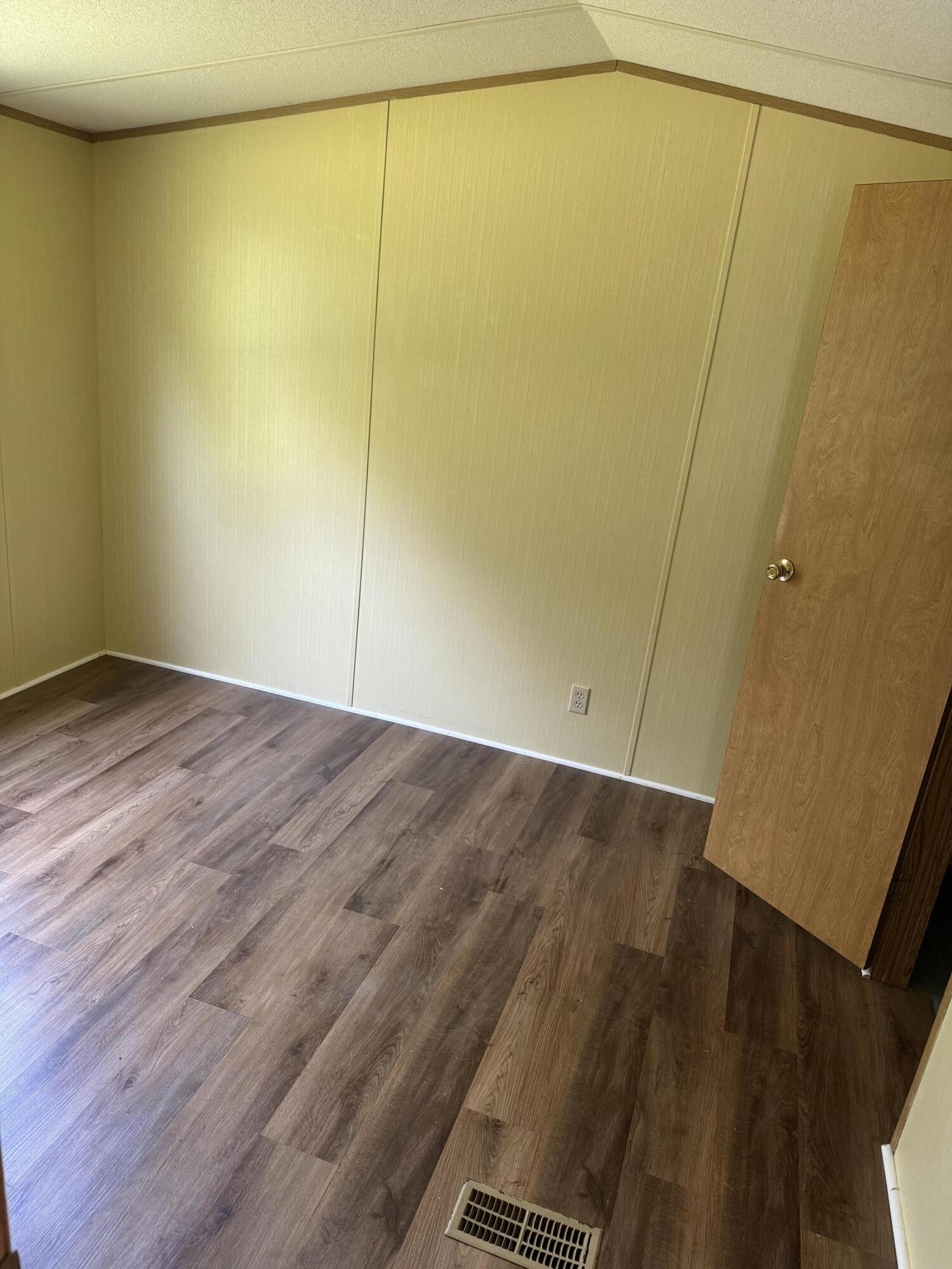 7180 Henry Road Henry, VA 24102 - Photo 6 of 12 a view of a room with wooden floor