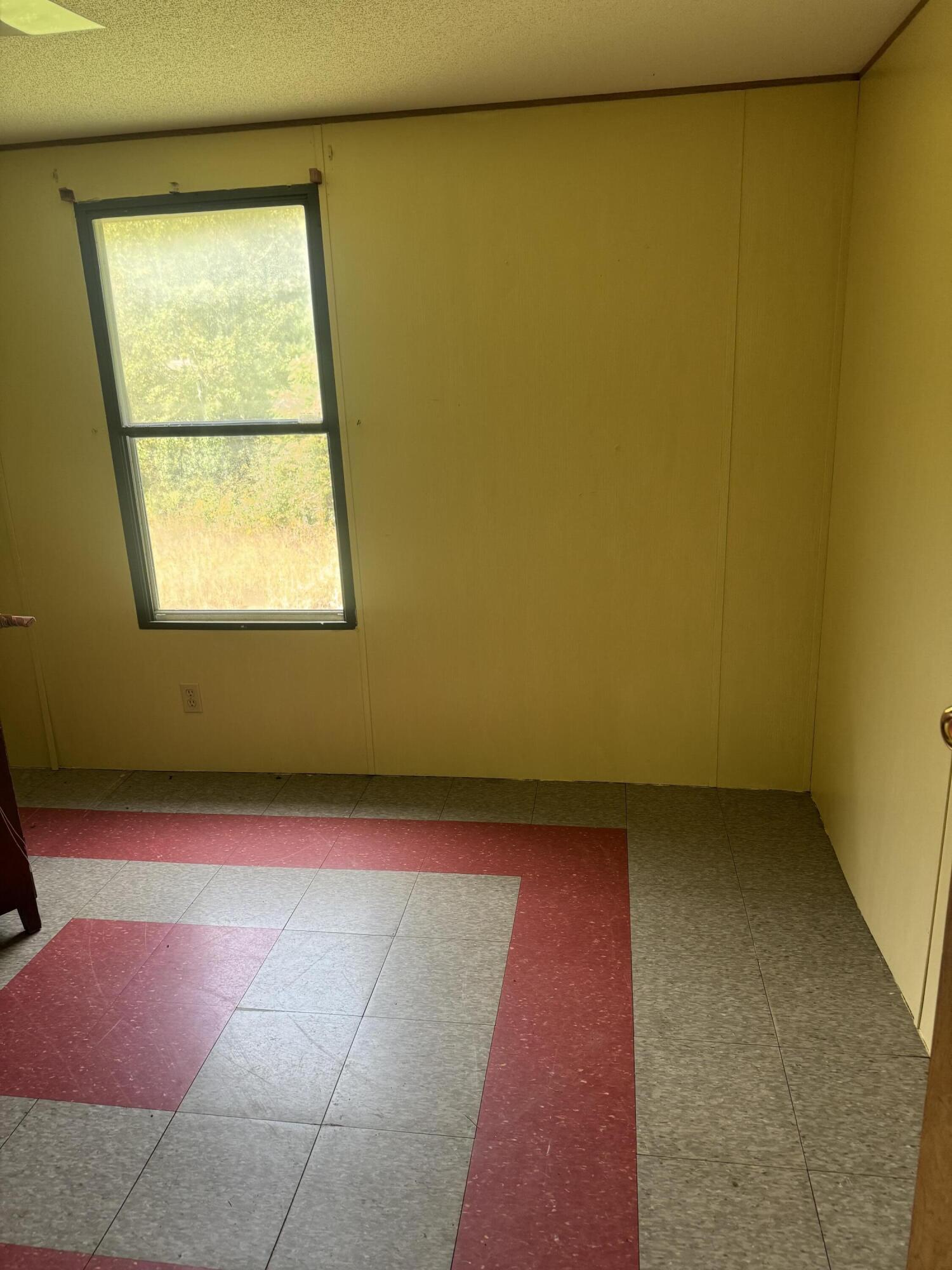 7180 Henry Road Henry, VA 24102 - Photo 9 of 12 an empty room with a window