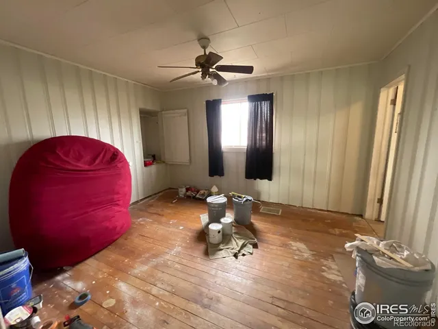 a room with furniture and a mirror