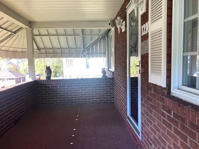 a view of door with glass door