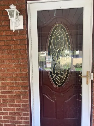 a view of room with window and furniture