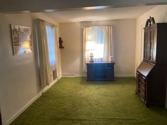 a kitchen with stainless steel appliances granite countertop a refrigerator a stove and a sink