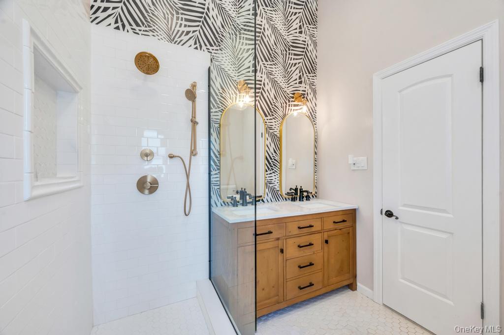 357 Wynsum Avenue Merrick, NY 11566 - Photo 35 of 40 a bathroom with a double vanity sink