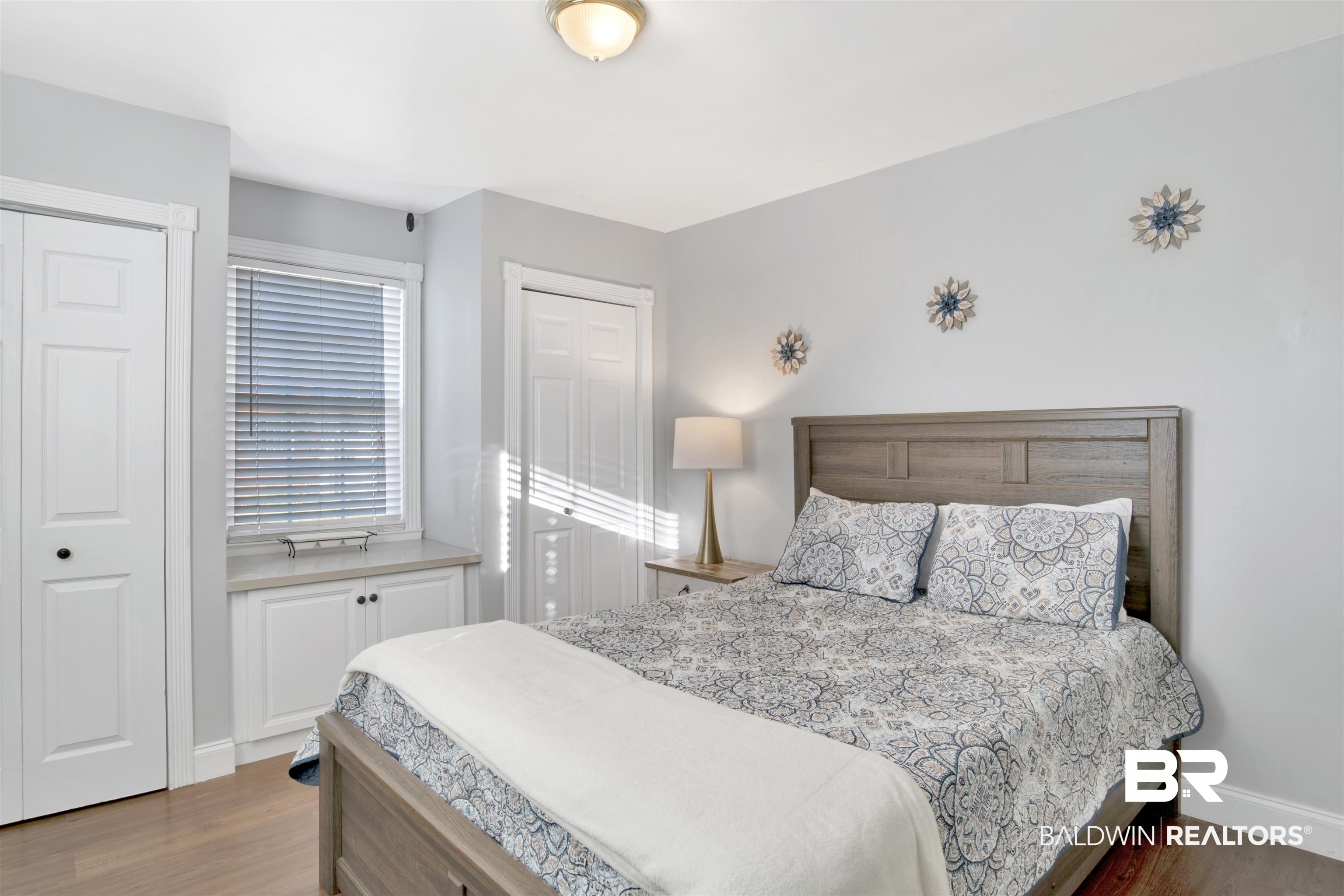 214 Upham Street, Unit 7A Mobile, AL 36607 - Photo 14 of 35 Bedroom featuring dark wood-style flooring and a closet