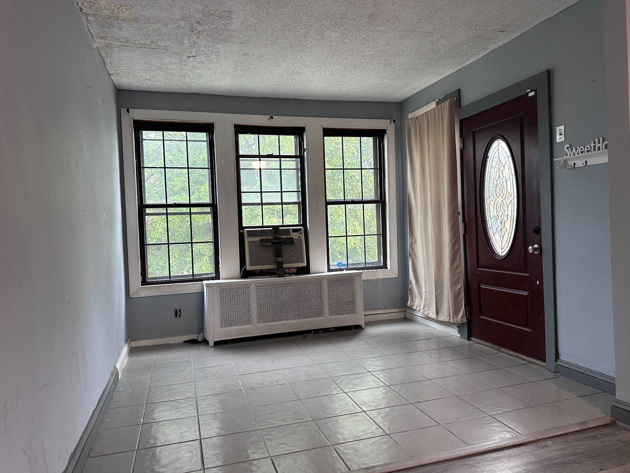 1154 Brill Street Philadelphia, PA 19124 - Photo 8 of 47 Bright entryway with charming windows