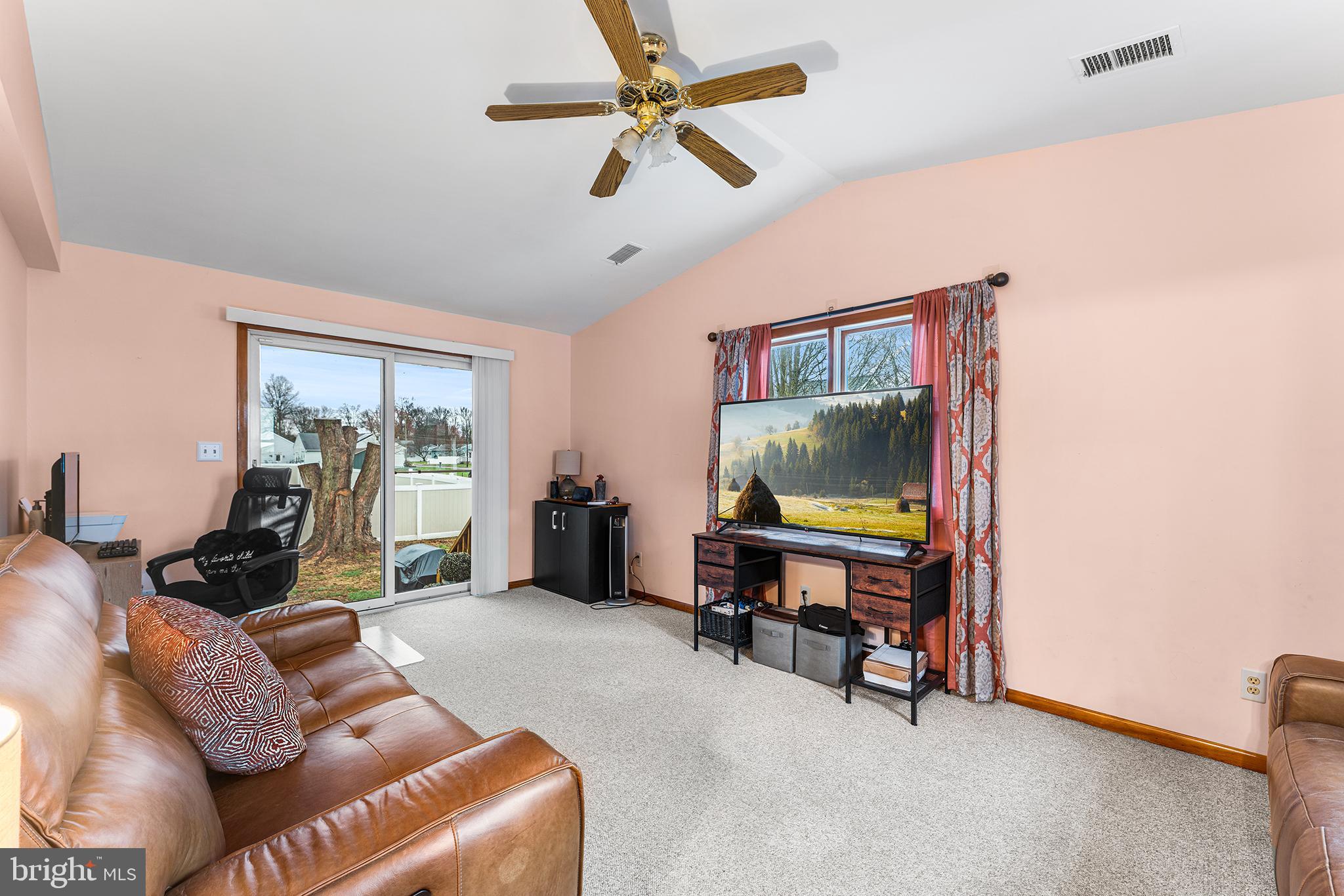 131 Quaker Road Pennsville, NJ 08070 - Photo 15 of 36 a living room with furniture and a flat screen tv