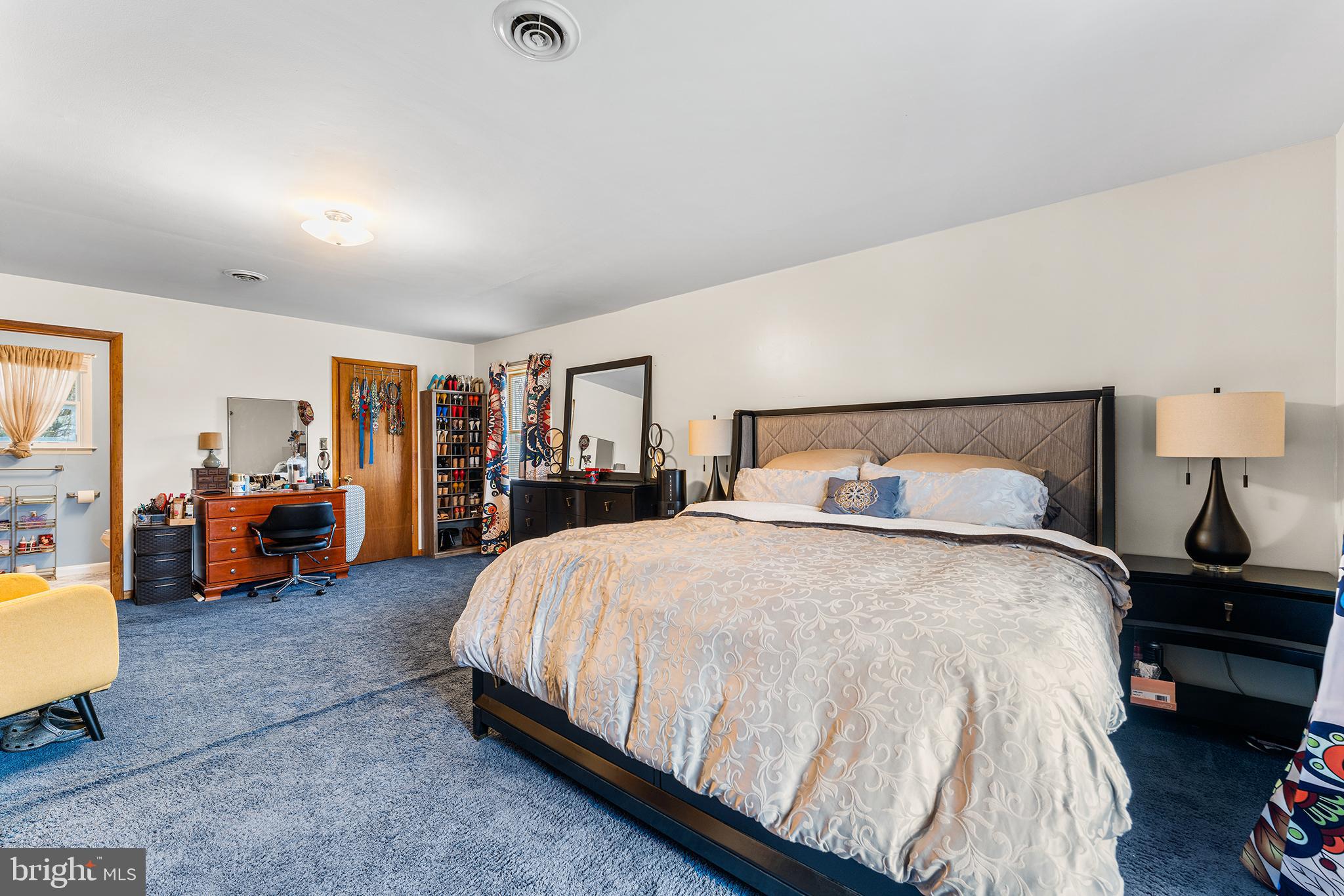 131 Quaker Road Pennsville, NJ 08070 - Photo 25 of 36 a bedroom with bed and dresser