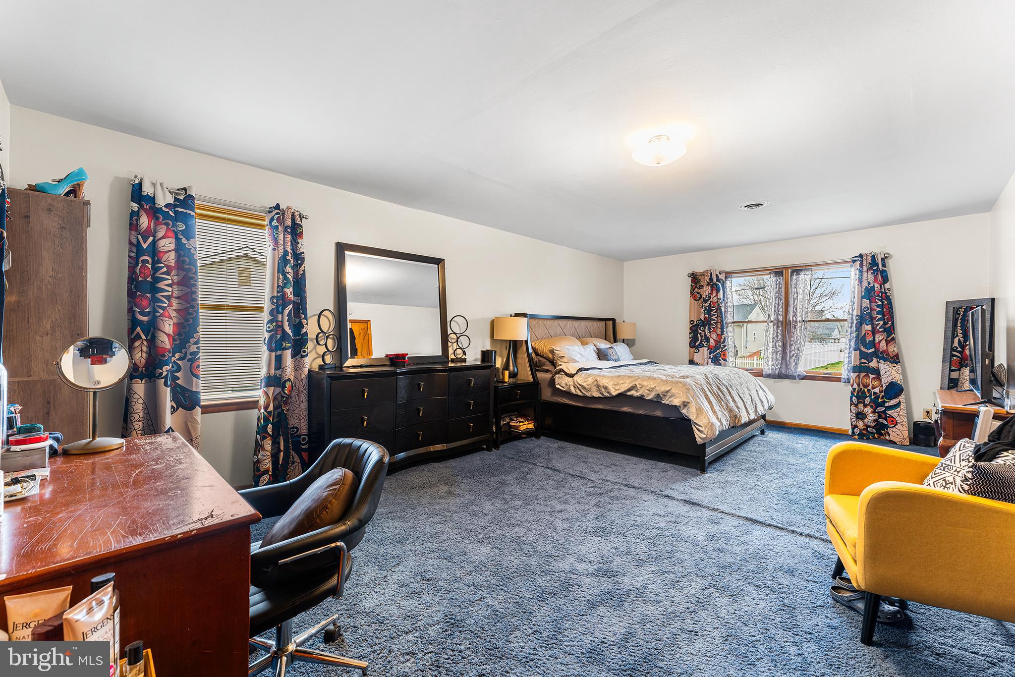 131 Quaker Road Pennsville, NJ 08070 - Photo 28 of 36 a bedroom with furniture and a flat screen tv