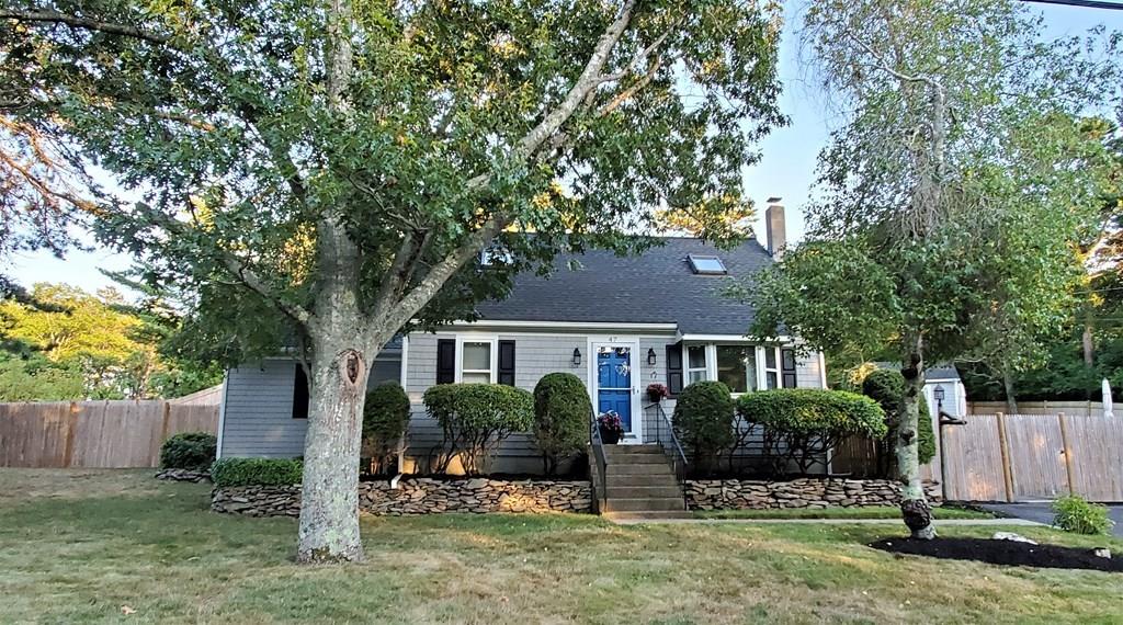 47 Blissful Lane Wareham, MA 02538 - Photo 1 of 24 a front view of a house with a yard