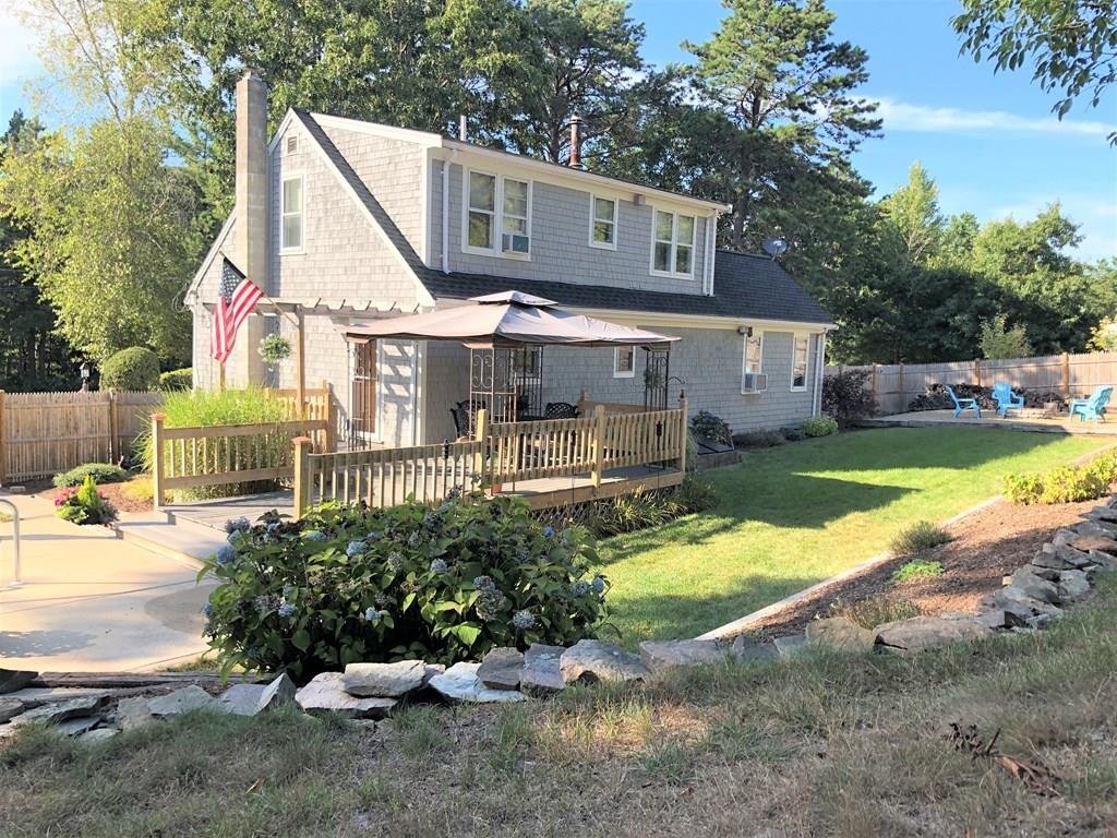47 Blissful Lane Wareham, MA 02538 - Photo 20 of 24 a view of a house with backyard and sitting area