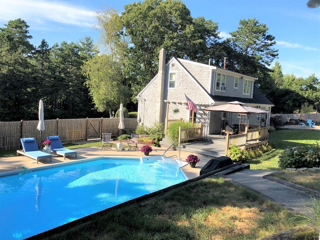 47 Blissful Lane Wareham, MA 02538 - Photo 2 of 24 a view of a house with backyard and sitting area