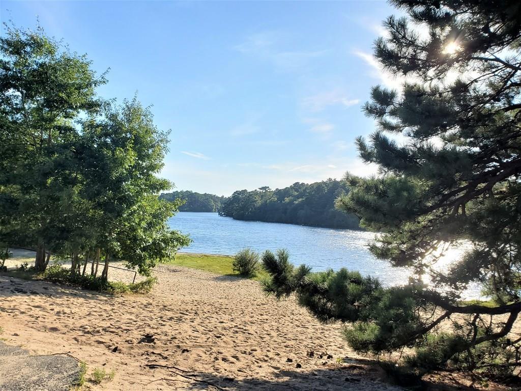 47 Blissful Lane Wareham, MA 02538 - Photo 24 of 24 a view of a lake with a mountain in the background