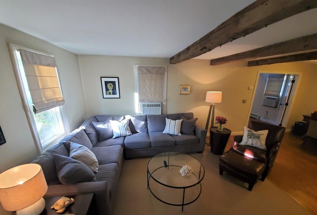 47 Blissful Lane Wareham, MA 02538 - Photo 7 of 24 a living room with furniture and a large window
