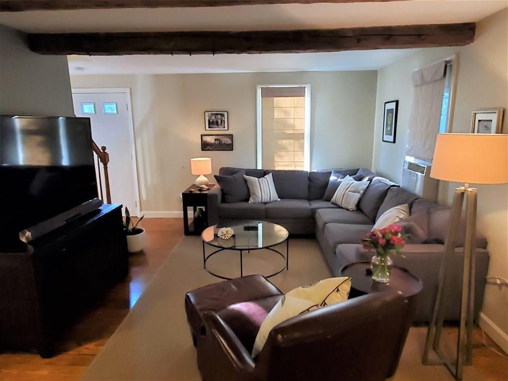 47 Blissful Lane Wareham, MA 02538 - Photo 8 of 24 a living room with furniture and a flat screen tv