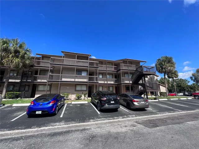 a car parked in front of a building