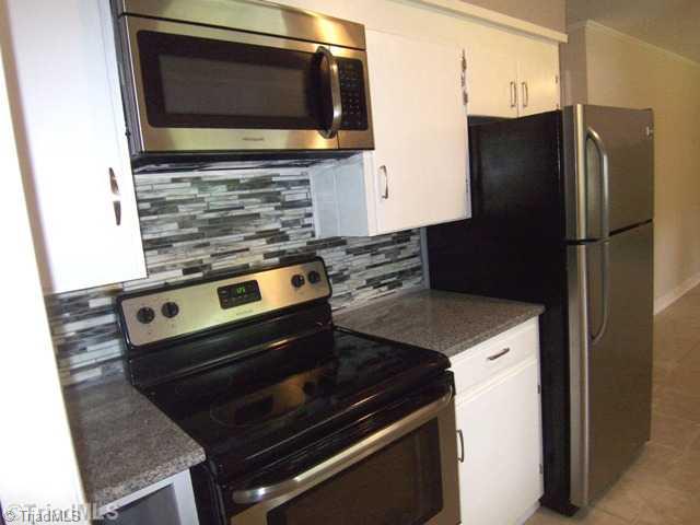 784 Motor Road Winston-Salem, NC 27105 - Photo 7 of 16 Kitchen. Stainless steel appliances to remain.