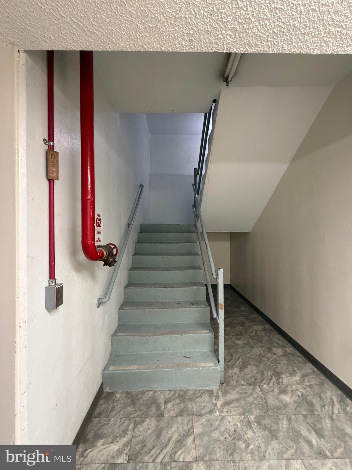 5225 Pooks Hill Road, Unit C29N Bethesda, MD 20814 - Photo 5 of 54 Stairway to Upper Levels from C Level