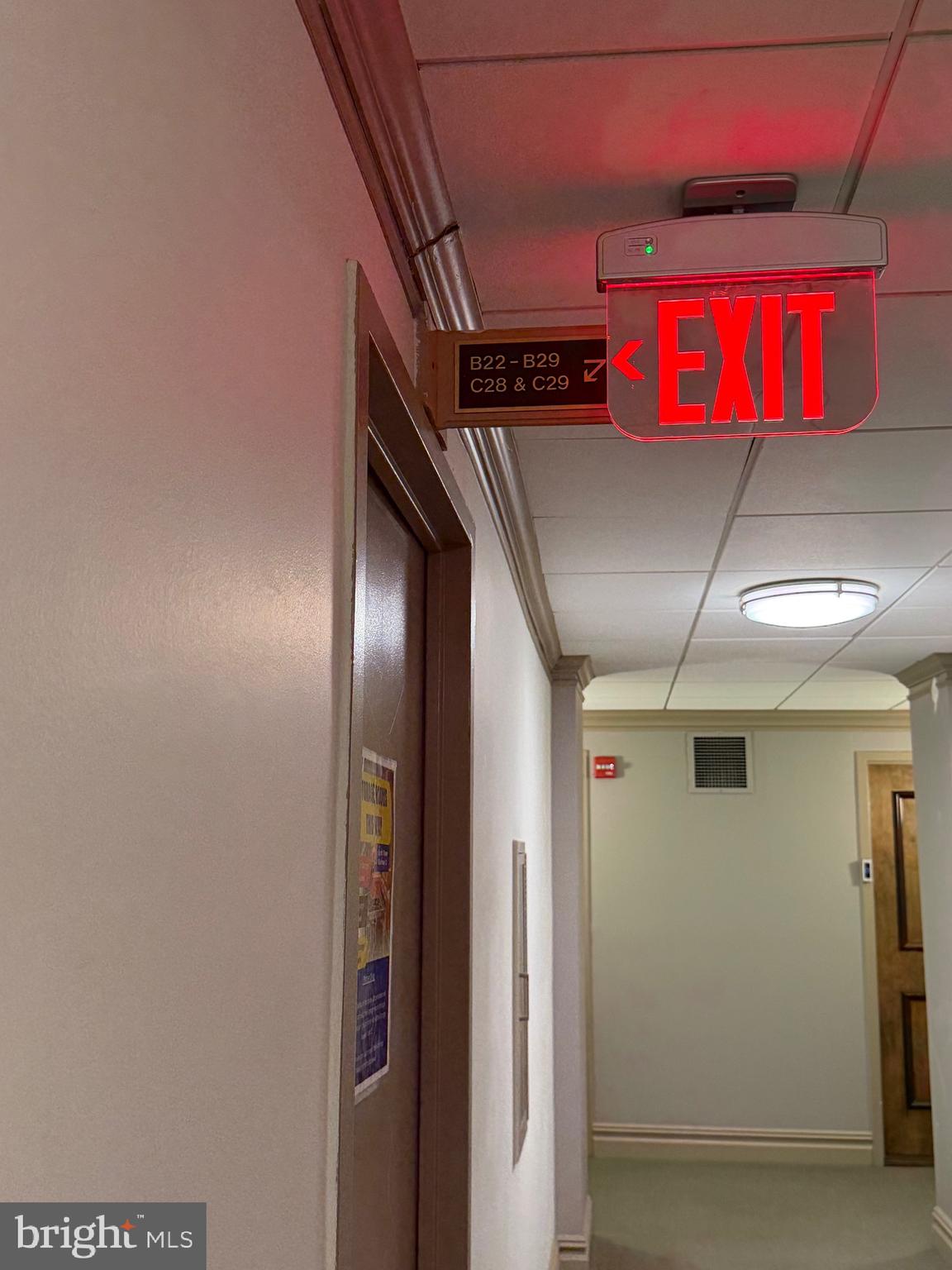 5225 Pooks Hill Road, Unit C29N Bethesda, MD 20814 - Photo 7 of 54 Signage at Arcade North Corridor - Stairway to C L