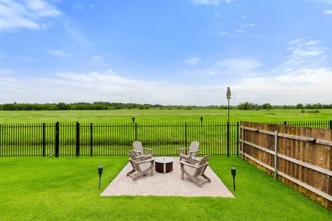 a view of a garden with an outdoor space