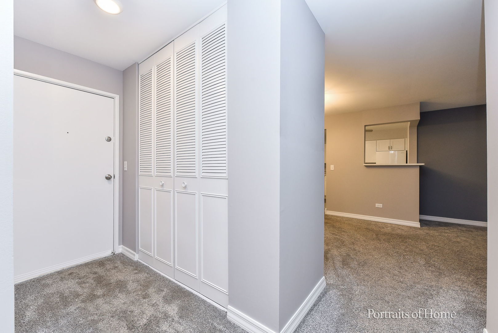 6630 South Brainard Avenue, Unit 203 Countryside, IL 60525 - Photo 5 of 22 an empty room with windows