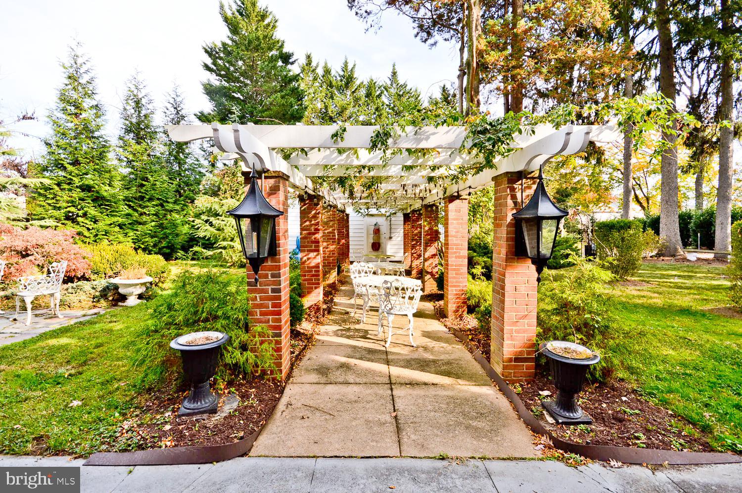 1847 Middlebridge Drive Silver Spring, MD 20906 - Photo 56 of 64 Courtyard w/ Wood Pergola and walkway