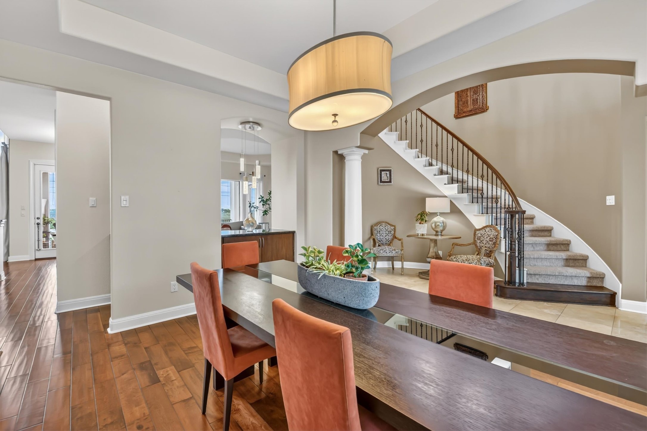 2000 Rio Mesa Drive Austin, TX 78732 - Photo 11 of 39 The dining area features hardwood floors, a tray ceiling, and an elegant chandelier