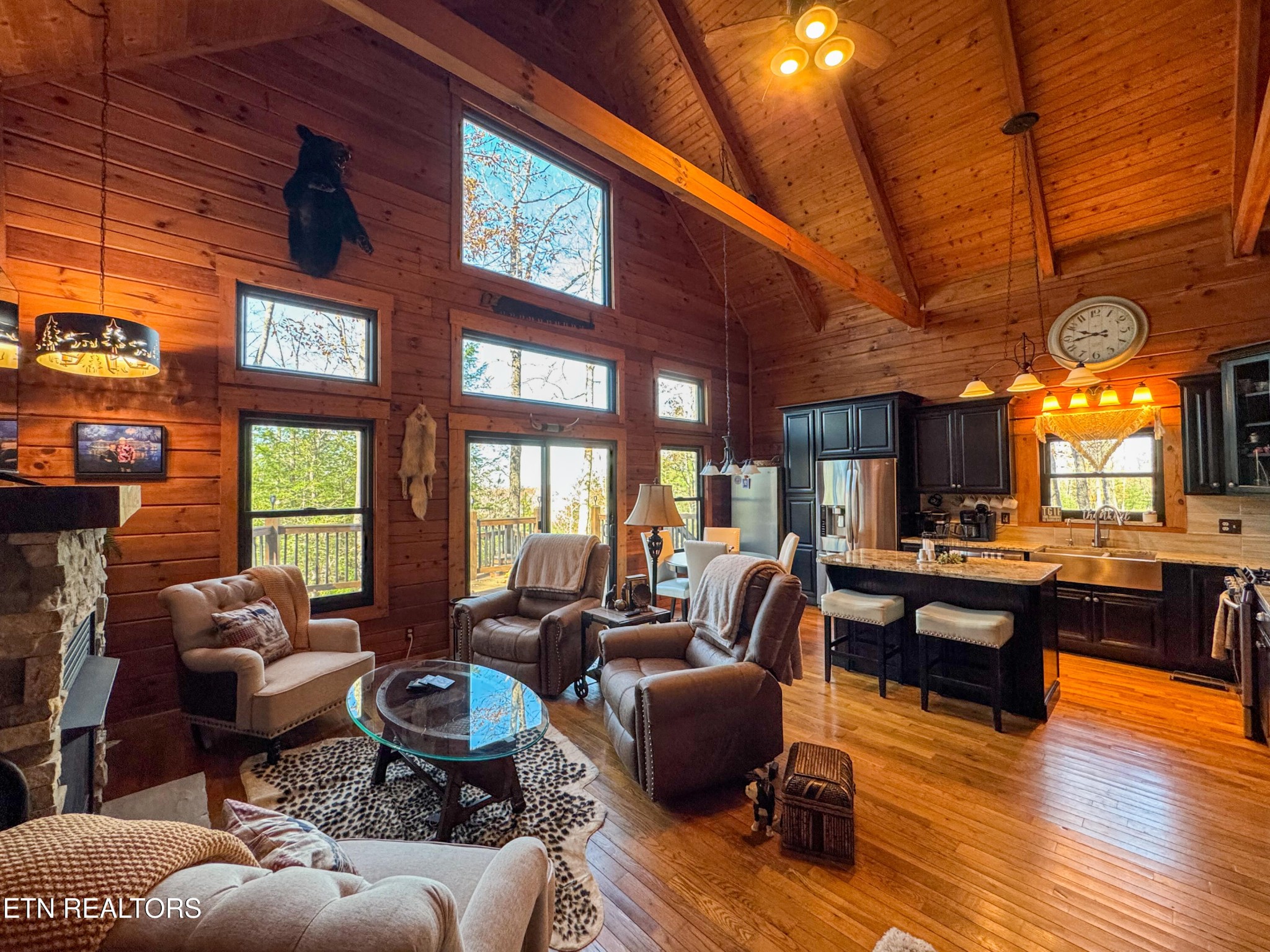 390 John J Smith Road Oneida, TN 37841 - Photo 11 of 56 a living room with fireplace furniture and a large window