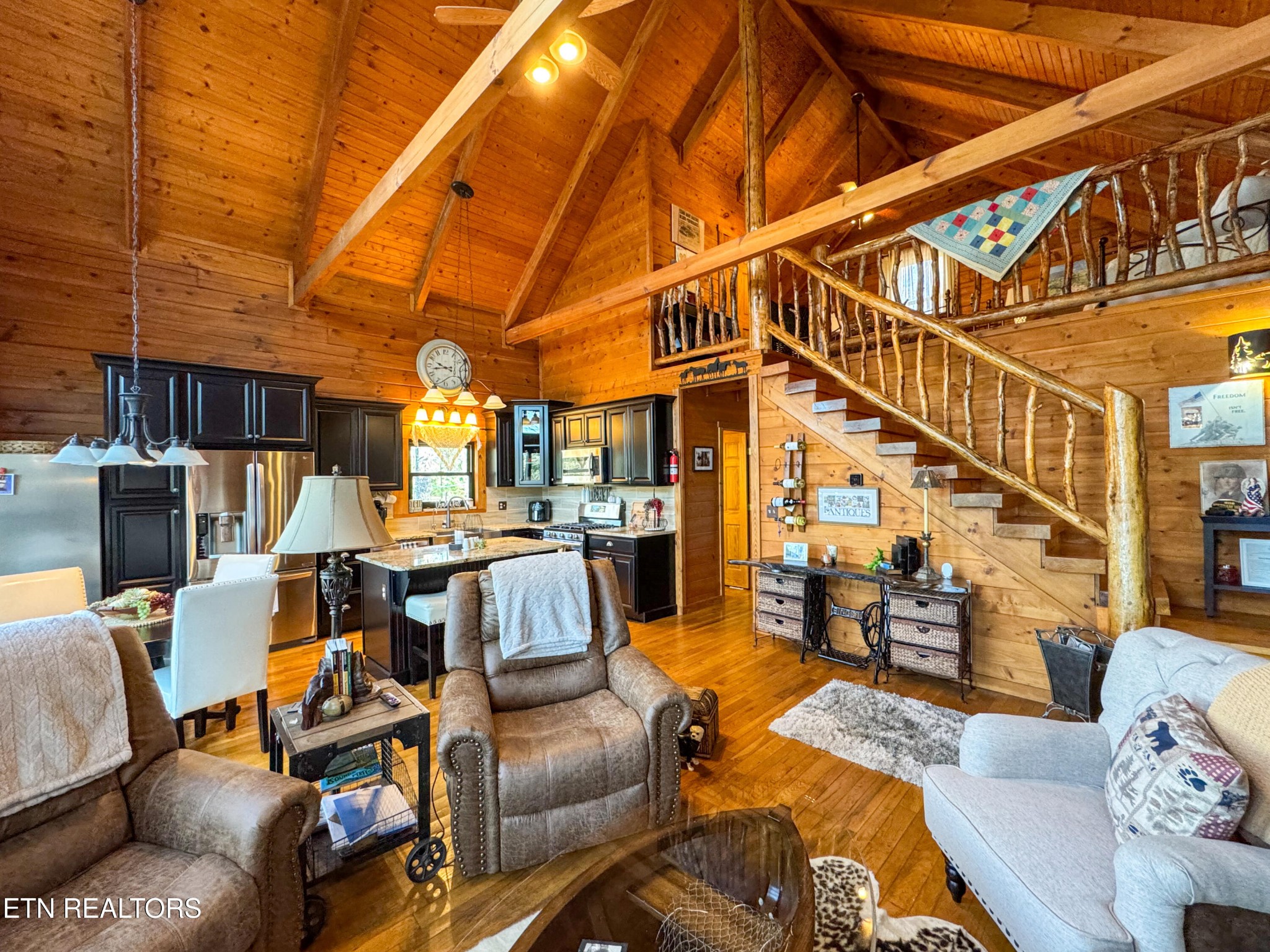 390 John J Smith Road Oneida, TN 37841 - Photo 13 of 56 a view of a livingroom with furniture and a rug