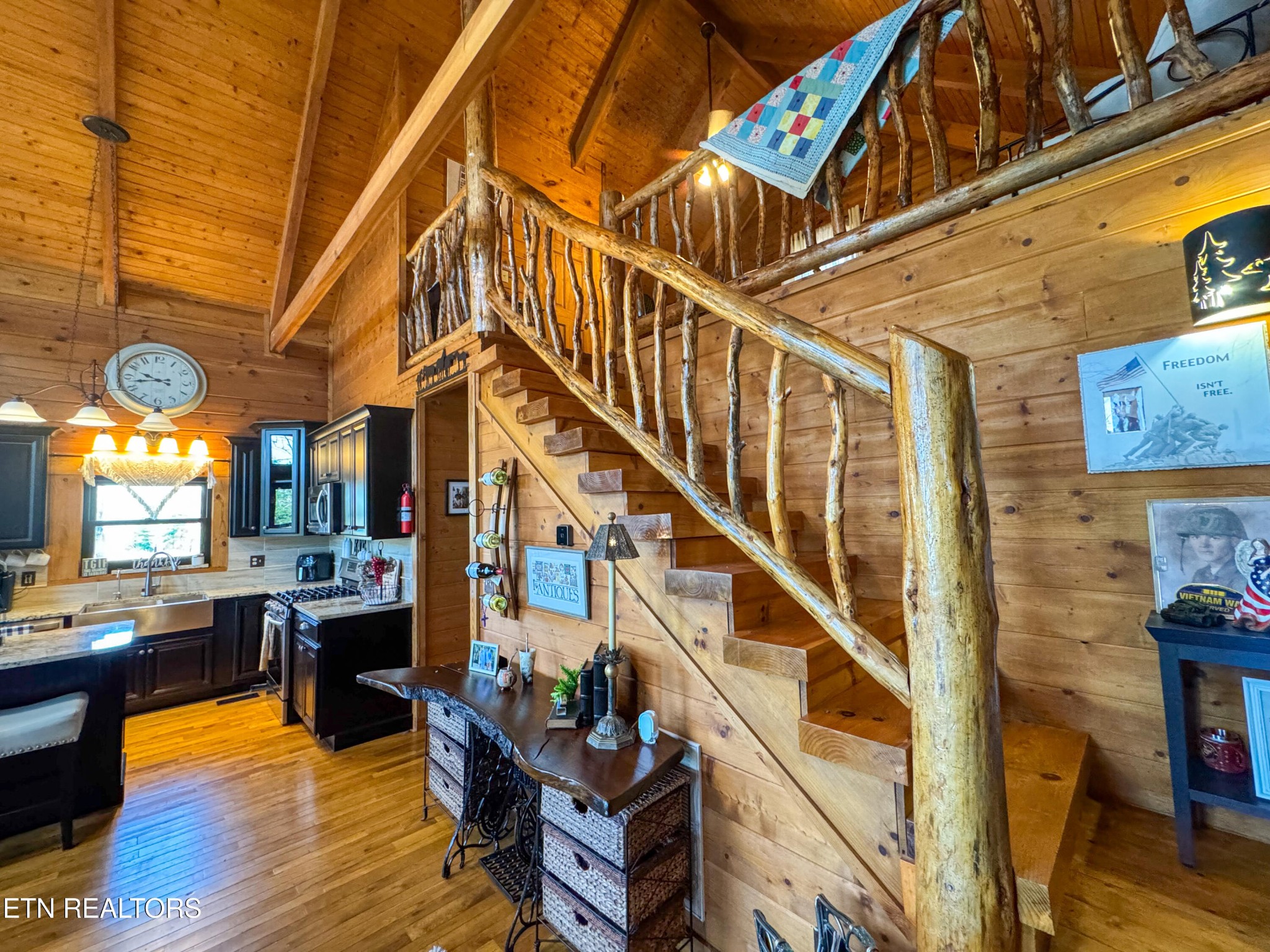 390 John J Smith Road Oneida, TN 37841 - Photo 26 of 56 a view of entryway dining room and hall with wooden floor