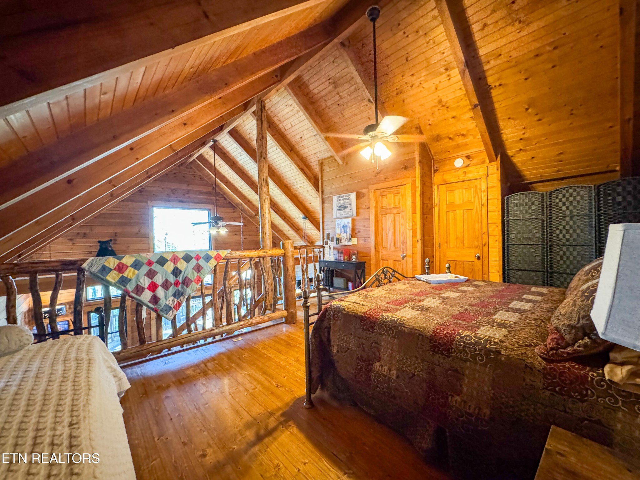 390 John J Smith Road Oneida, TN 37841 - Photo 28 of 56 a view of a balcony with furniture and front door