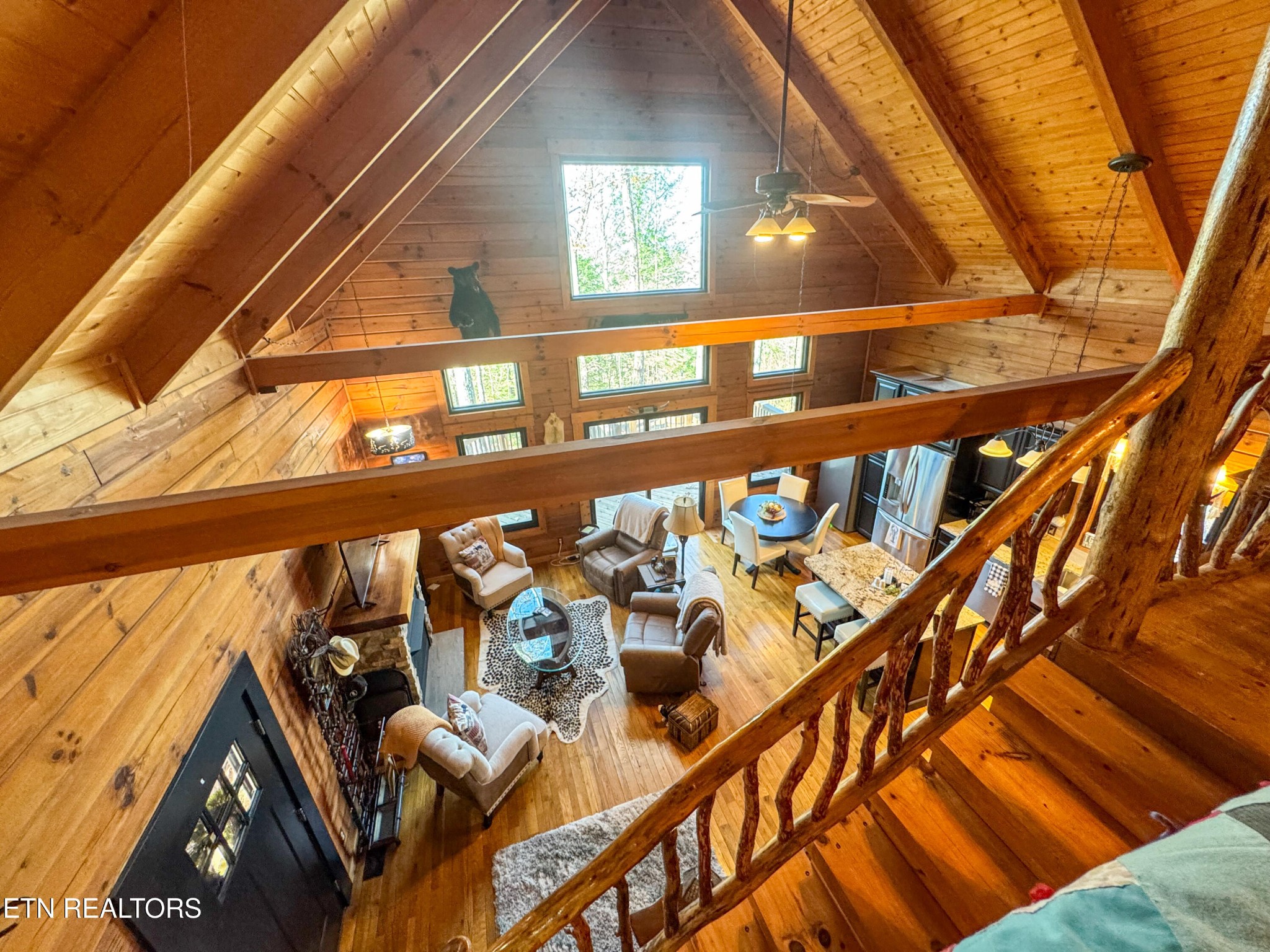 390 John J Smith Road Oneida, TN 37841 - Photo 29 of 56 a front view of a building with glass door