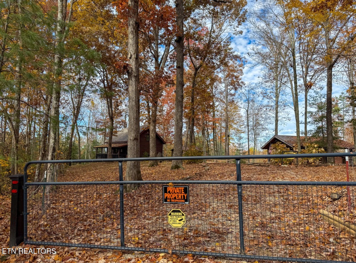 390 John J Smith Road Oneida, TN 37841 - Photo 55 of 56 a view of a yard with wooden fence