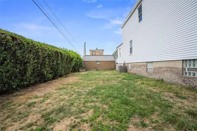 a view of a backyard with plants