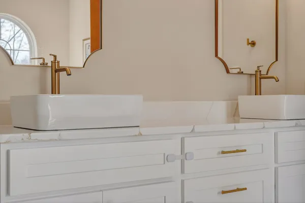 a bathroom with a bathtub and sink