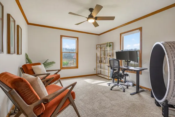 a living room with furniture and a window