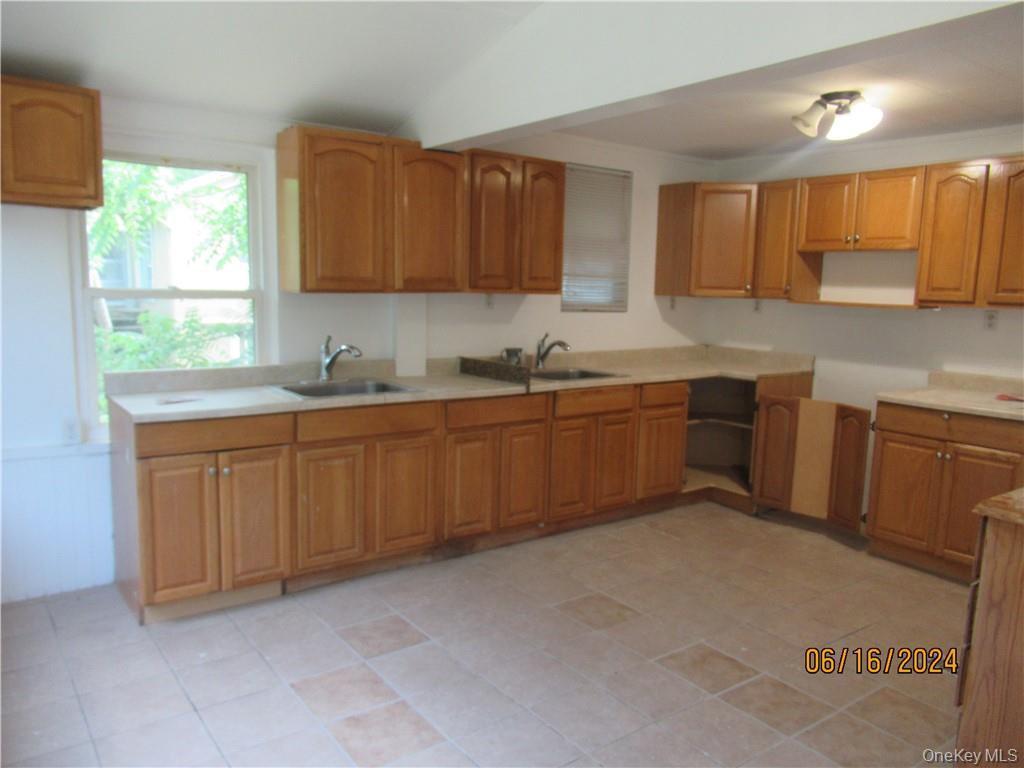 82 North Road Bloomingburg, NY 12721 - Photo 4 of 19 Kitchen featuring sink and light tile floors
