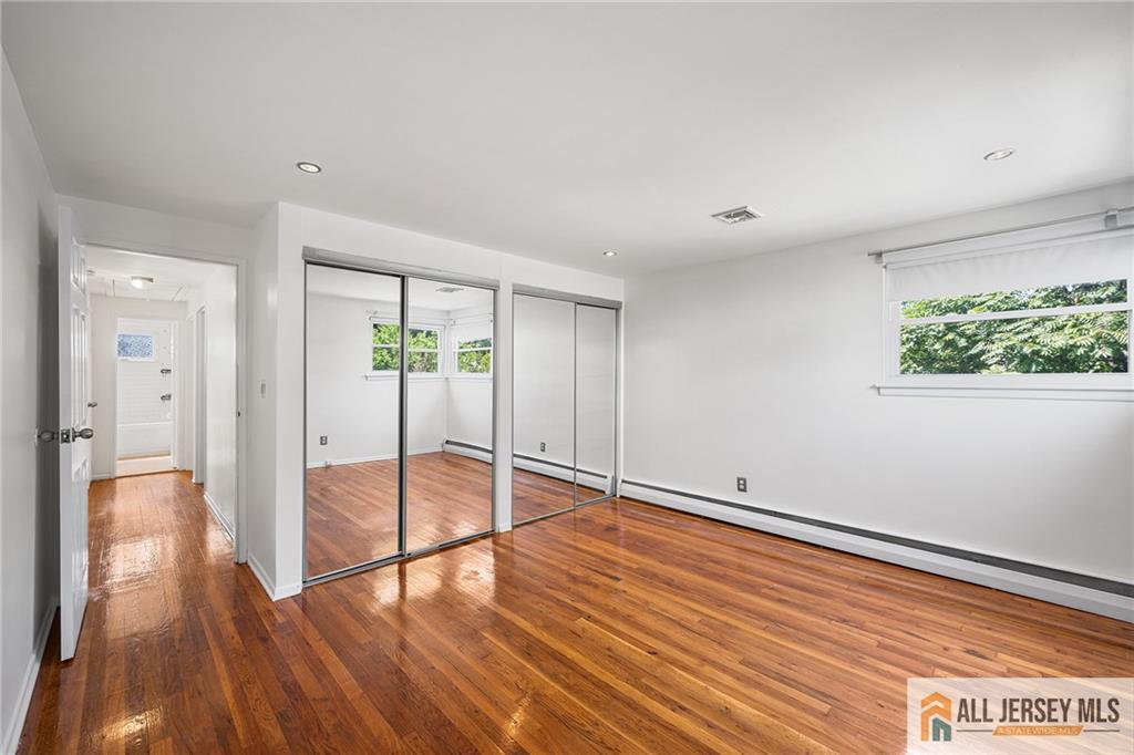 21 Eardley Road Edison, NJ 08817 - Photo 15 of 40 a view of empty room with wooden floor