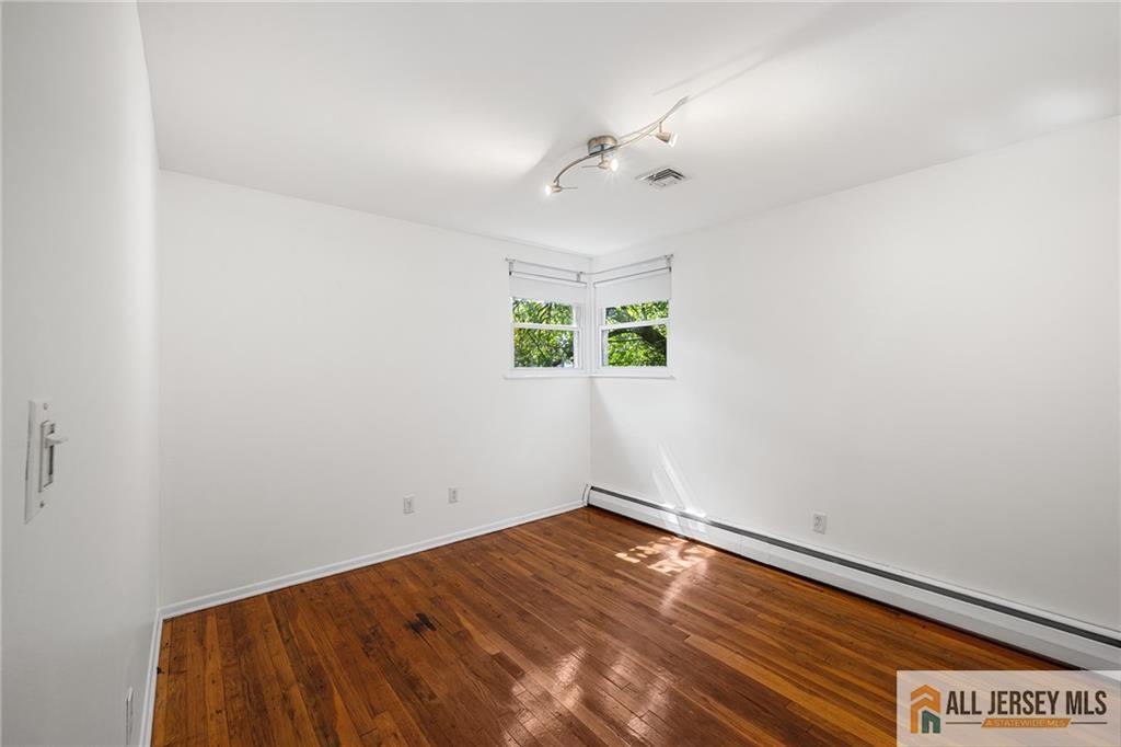 21 Eardley Road Edison, NJ 08817 - Photo 20 of 40 an empty room with a window