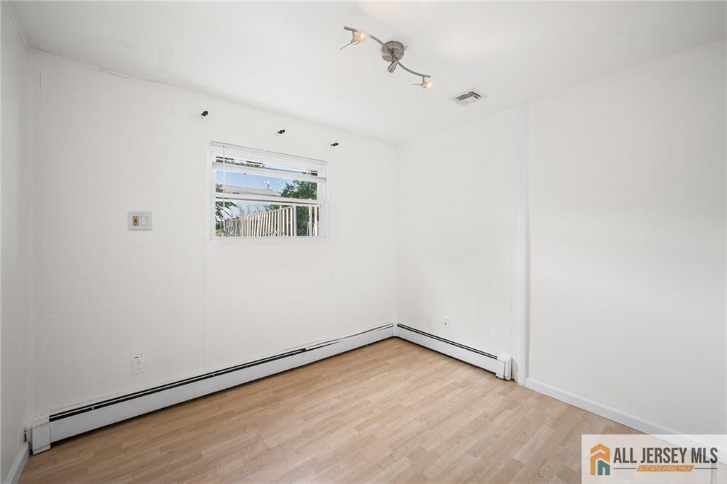21 Eardley Road Edison, NJ 08817 - Photo 32 of 40 a view of an empty room