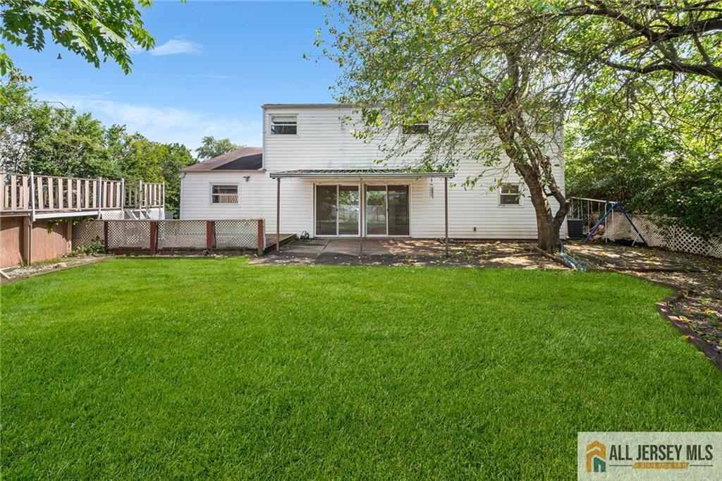 21 Eardley Road Edison, NJ 08817 - Photo 34 of 40 a view of a house with a yard and sitting area