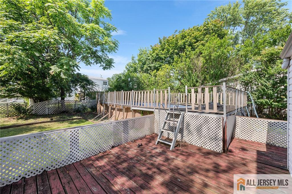 21 Eardley Road Edison, NJ 08817 - Photo 39 of 40 a view of deck with white and wooden fence
