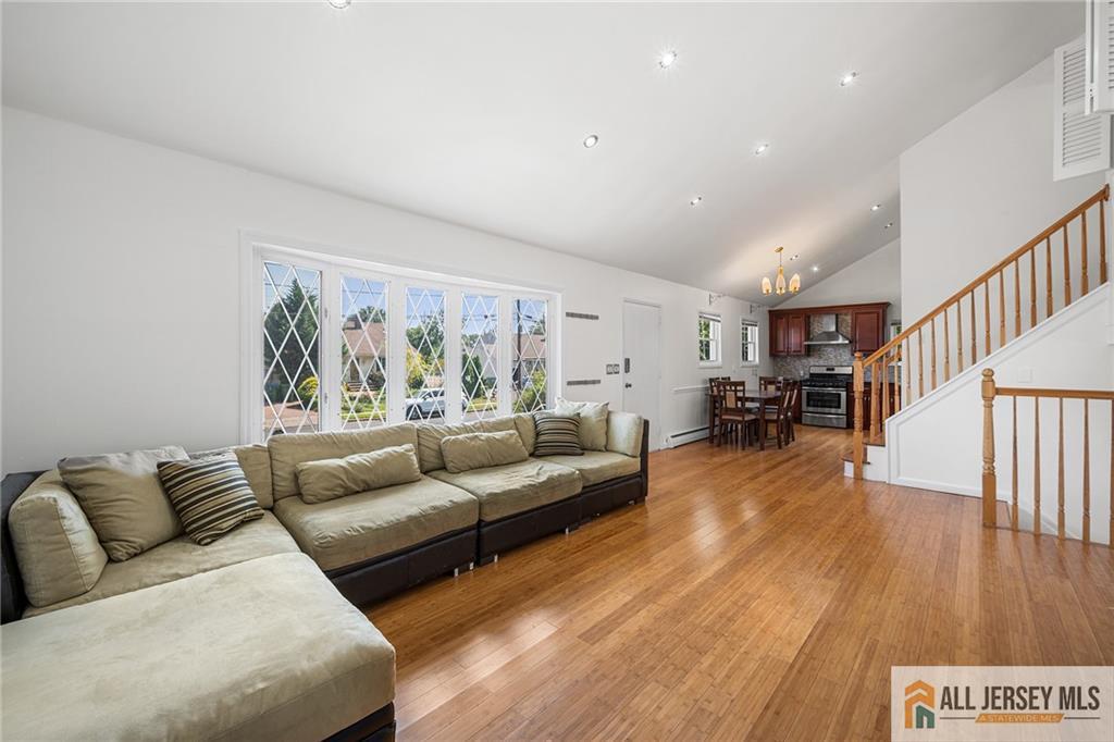 21 Eardley Road Edison, NJ 08817 - Photo 8 of 40 a living room with furniture and a wooden floor