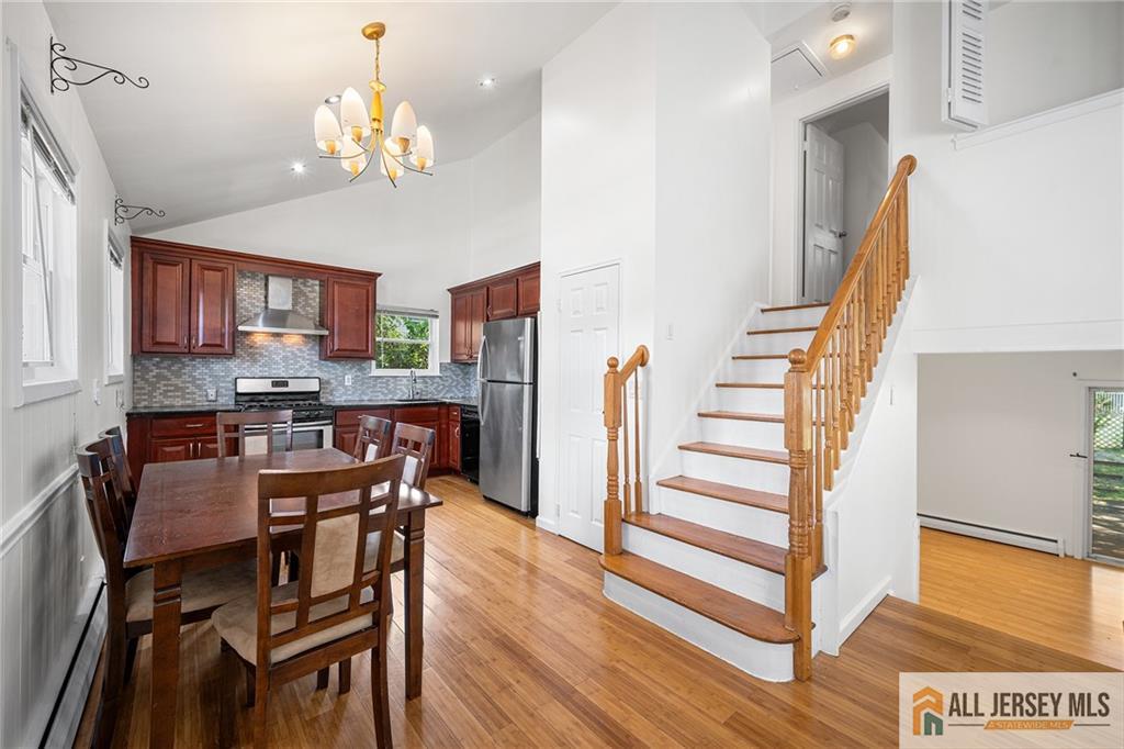 21 Eardley Road Edison, NJ 08817 - Photo 9 of 40 a view of a dining room with furniture and wooden floor