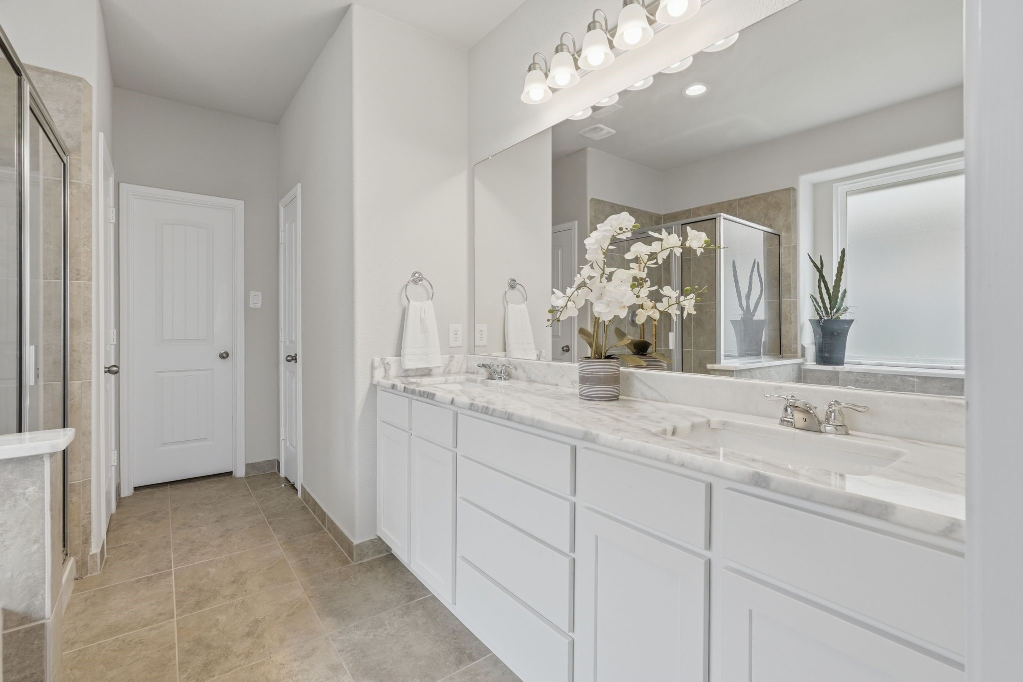 7522 Windsor View Drive Spring, TX 77379 - Photo 28 of 49 Bright and open bathroom layout with plenty of storage and natural light.