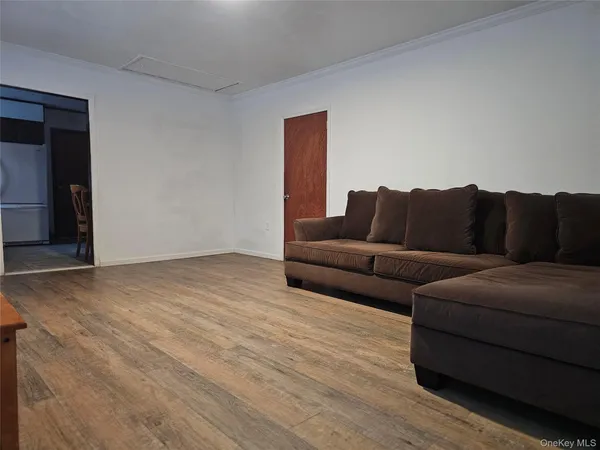a view of a livingroom with a couches and a coffee table