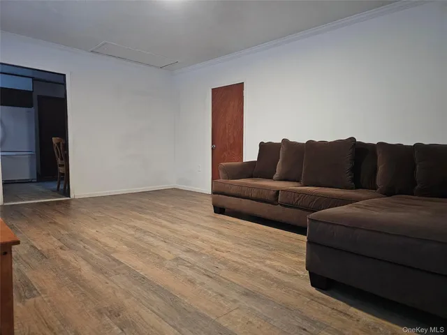 a view of a livingroom with a couches and a coffee table