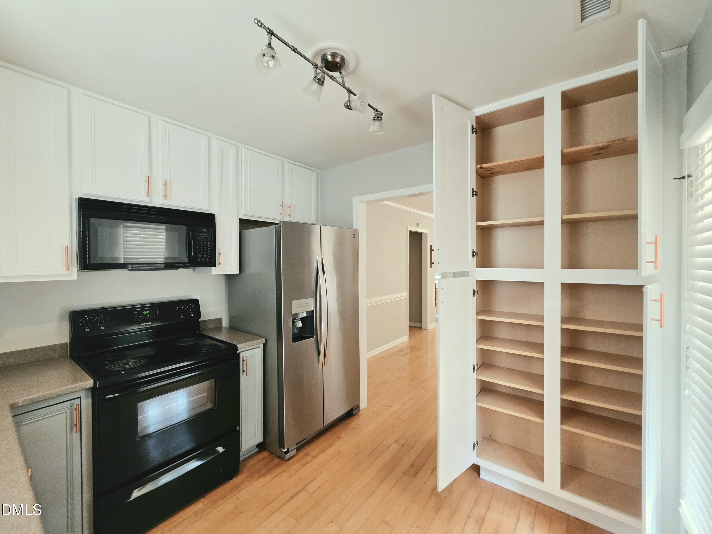 9716 Layla Avenue Raleigh, NC 27617 - Photo 7 of 16 Kitchen 3 with built-in pantry